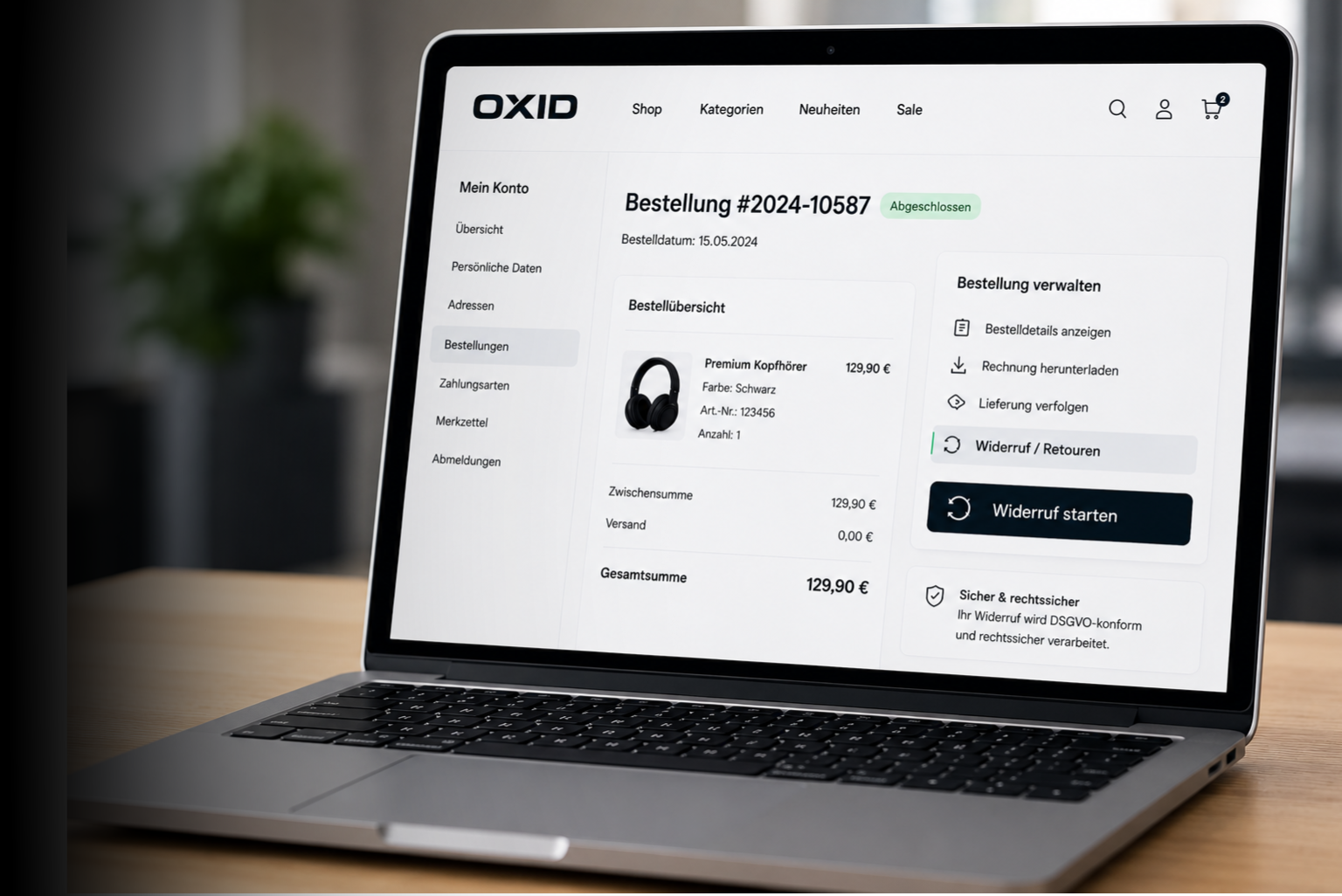 OPAL Widerrufsbutton im OXID Shop auf einem MacBook